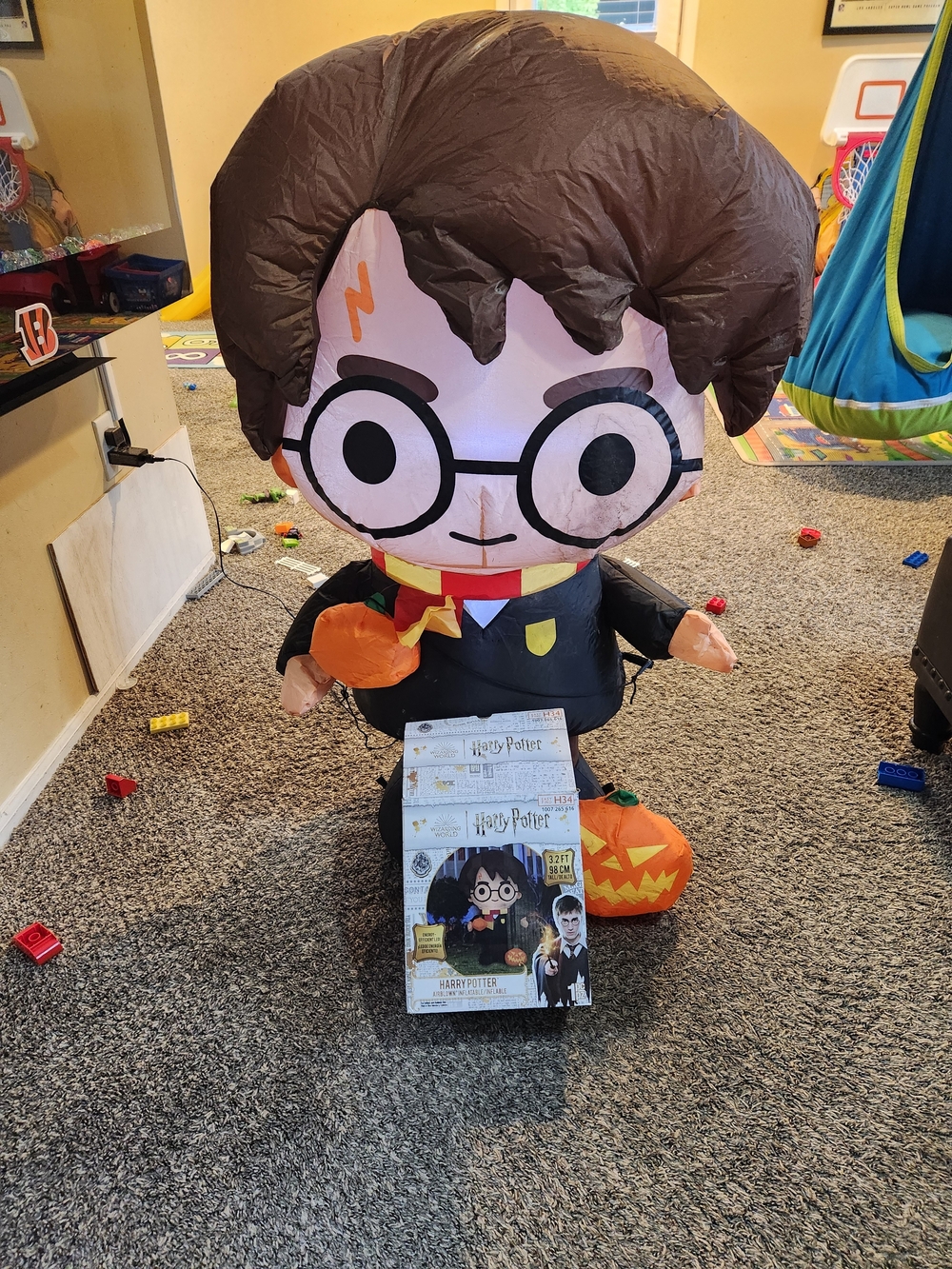 3 Ft Harry Potter Inflatable Figure with Pumpkin - Brown Hair, Black Robe